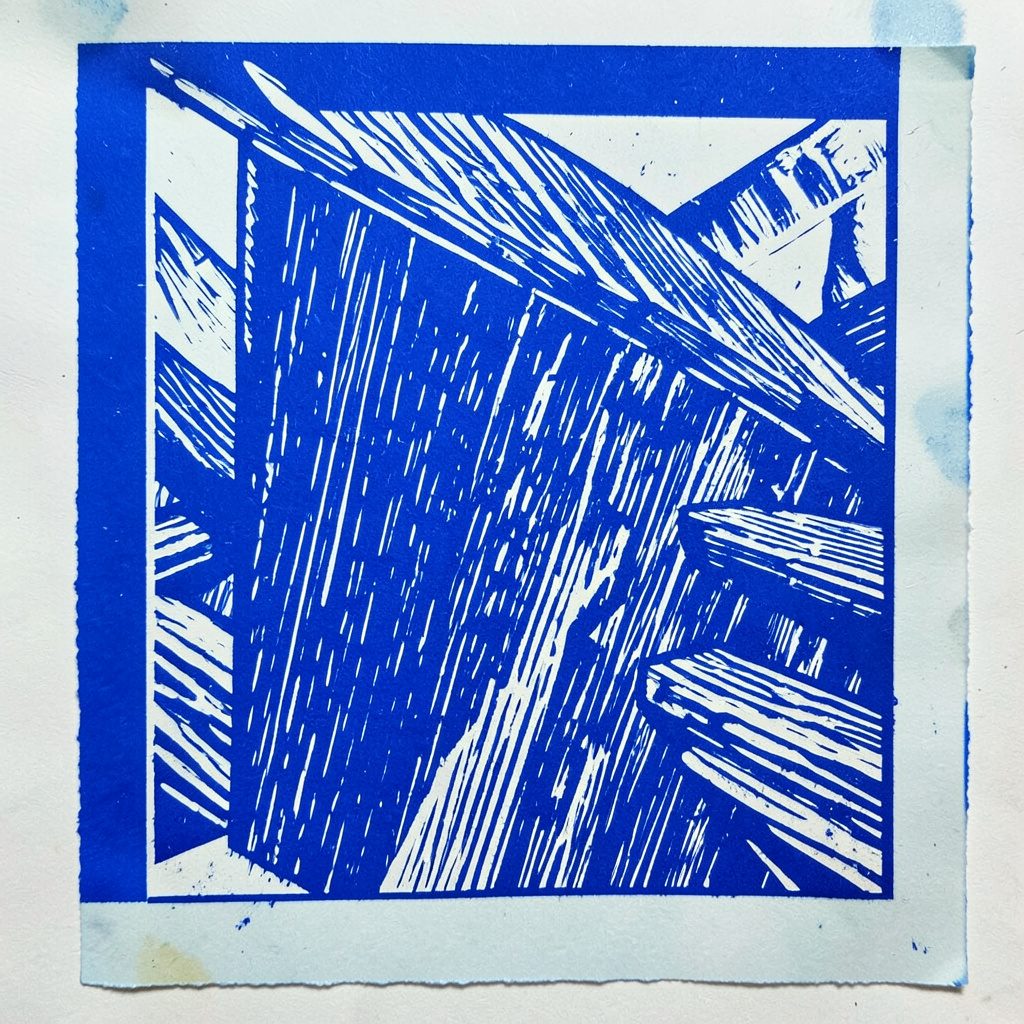Linocut relief print of overlapping abstract geometric shapes in muted charcoal, cream, and slate blue, evoking a contemplative editorial mood.