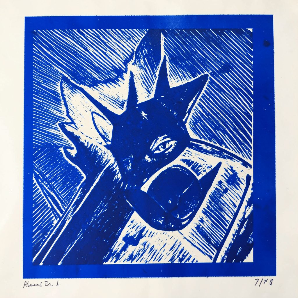 Linocut relief print of layered organic forms in warm ochre, charcoal, and off-white, suggesting a quiet domestic still life.